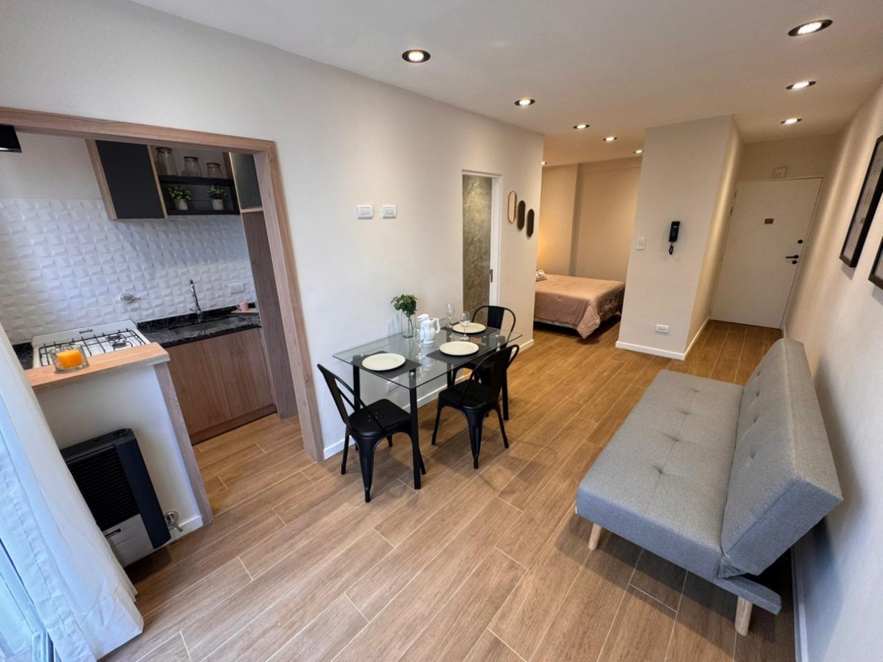 departamento monoambiente contrafrente con patio impecable estado