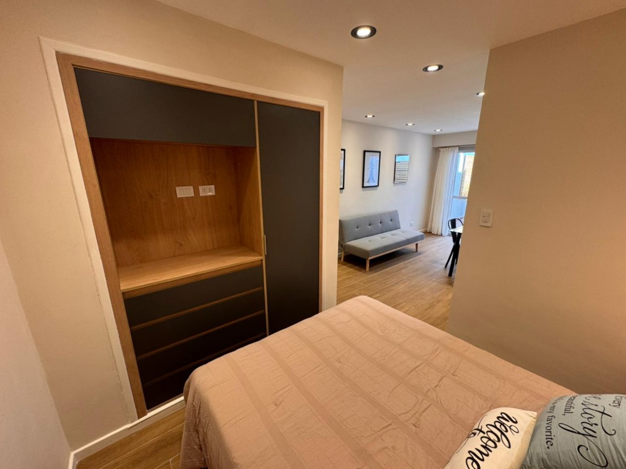 departamento monoambiente contrafrente con patio impecable estado