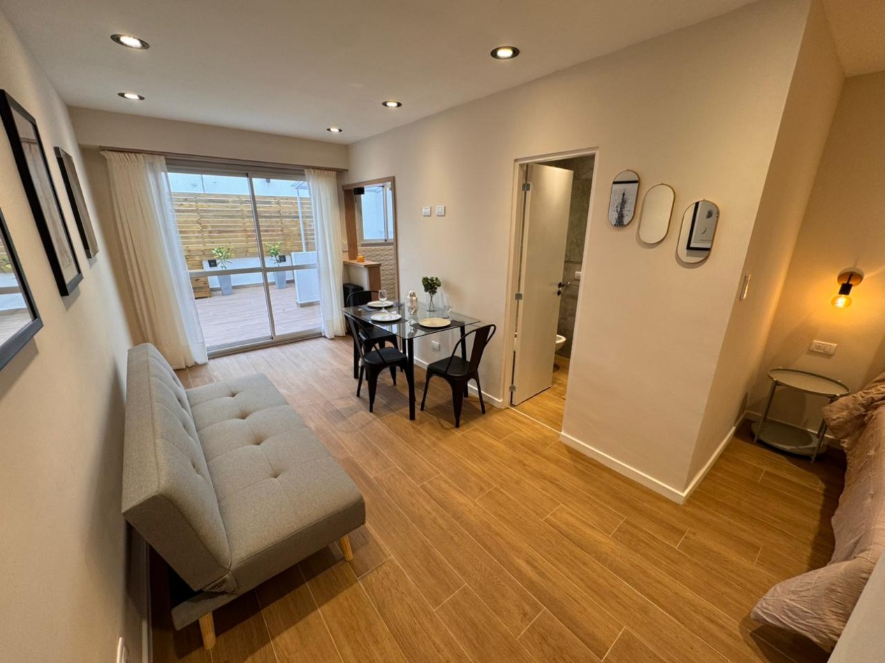 departamento monoambiente contrafrente con patio impecable estado